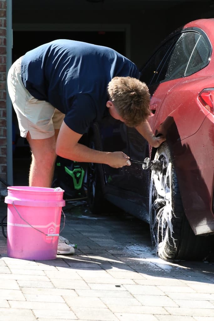 Deep-cleaned wheel and dressed tire during a ceramic install